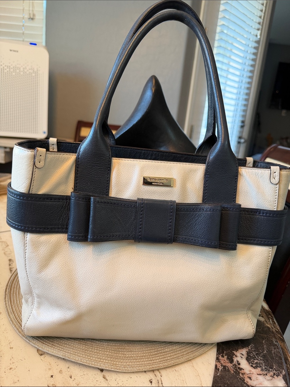 kate spade Ivory and Navy Pebbled Leather Bow-Accent Satchel w/Logo Bottom